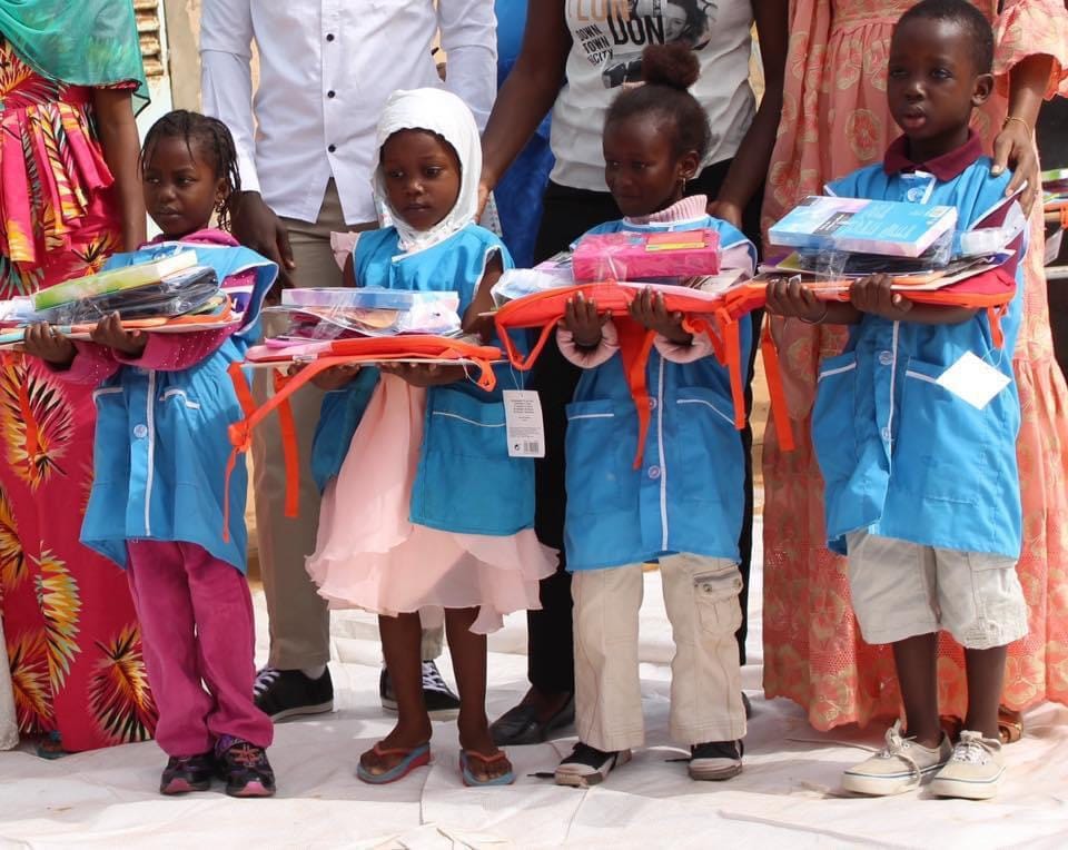 Image Archive. Opération sac à dos a l'école / préscolaire et  primaire de Pikine.